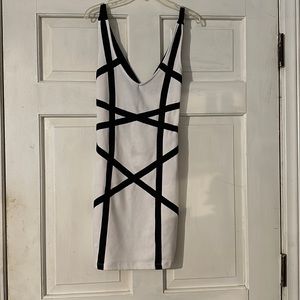 Dress with low cross over back